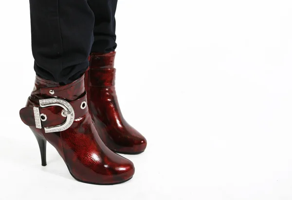 Botas sensuais vermelhas nas pernas — Fotografia de Stock