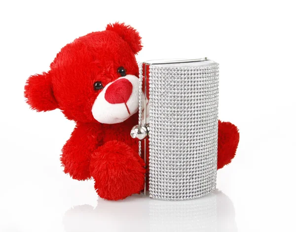 Red teddy bear and jeweled clutch bag — Stock Photo, Image