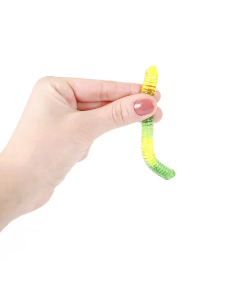 Gummy worm in hand — Stock Photo, Image