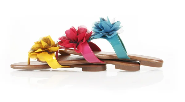Colored flip-flops with flowers — Stock Photo, Image