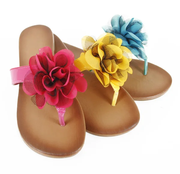 Färgade flip-flops med blommor — Stockfoto
