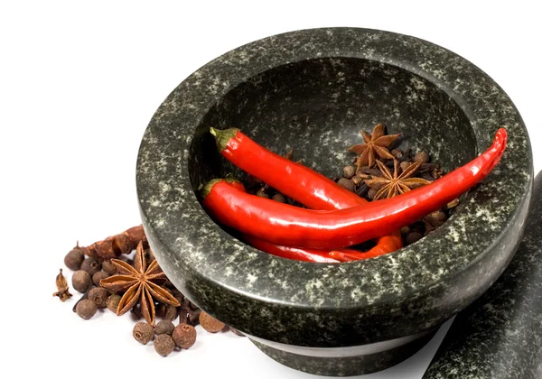 Stone mortar with spices and chilli — Stock Photo, Image