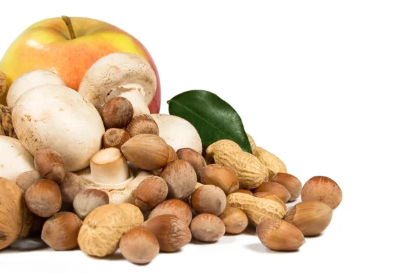 Apple, nuts and mushrooms — Stock Photo, Image