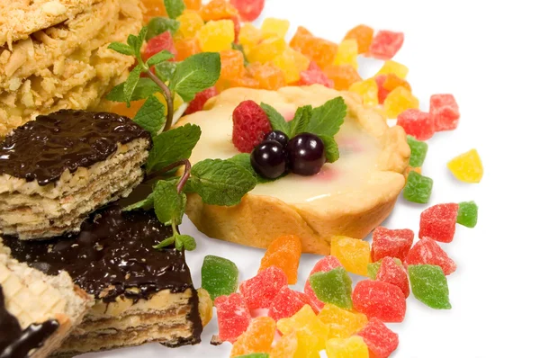 Cake , candied fruit , mint and chocolate — Stock Photo, Image