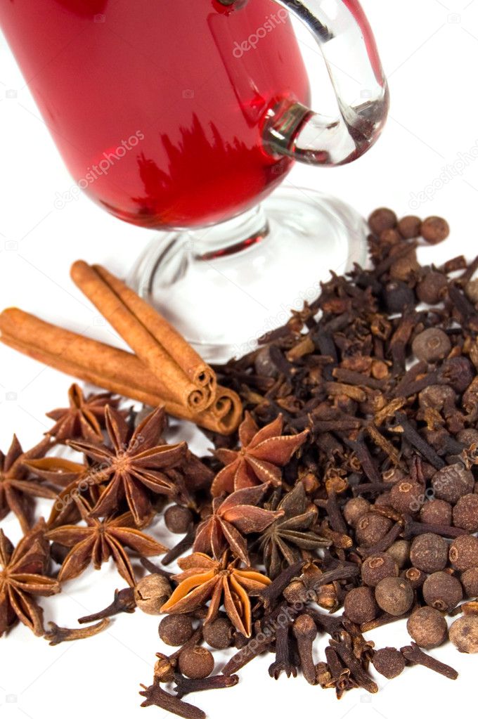 Glass of mulled wine with spices