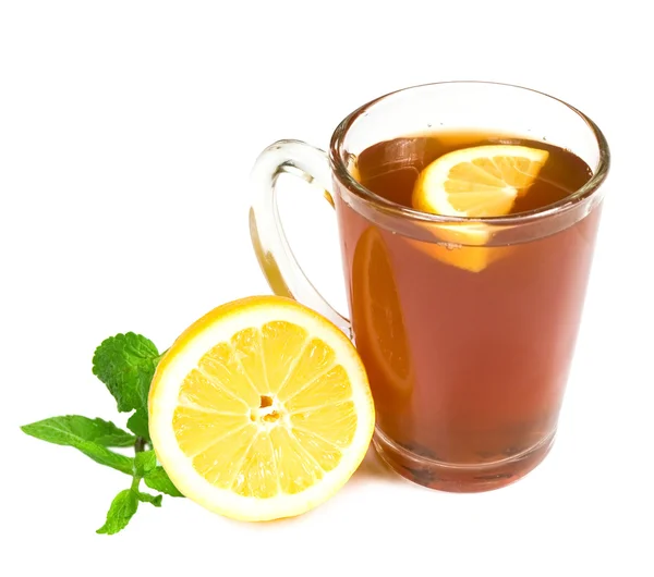 Glas kopje thee met munt en citroen — Stockfoto