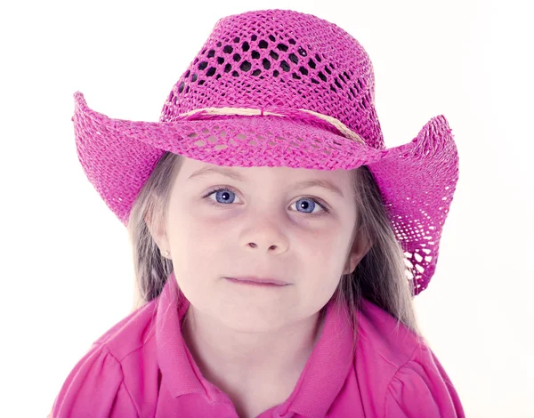 Gelukkig meisje met roze cowboy hoed — Stockfoto