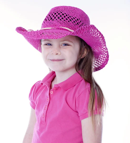 Menina bonito com chapéu de cowboy isolado no branco — Fotografia de Stock