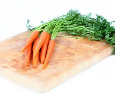 Carrots on wooden board