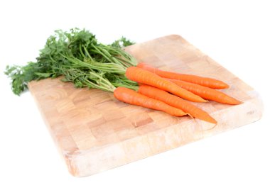 Carrots on wooden board
