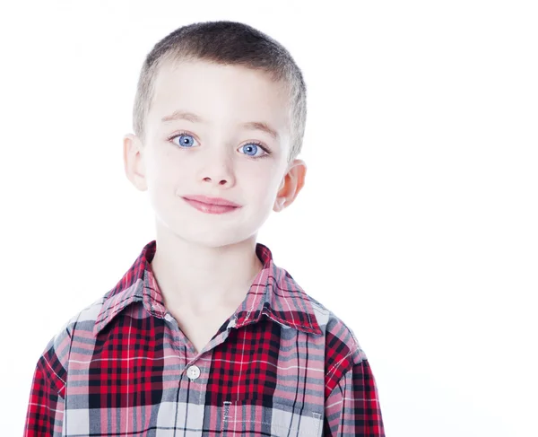 stock image Young boy in plaid shirt isolated on white