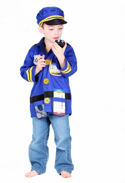 Młody chłopak przedszkola w kostium policji — Zdjęcie stockowe
