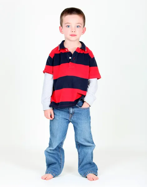 Young boy posing with hand in pocket — Stock Photo, Image
