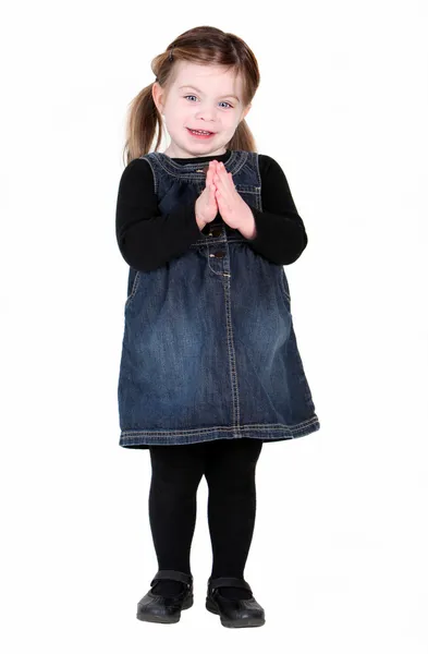 Menina muito criança com as mãos em oração — Fotografia de Stock