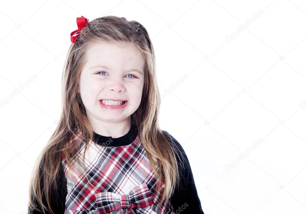 Young pretty girl in a dress on white background