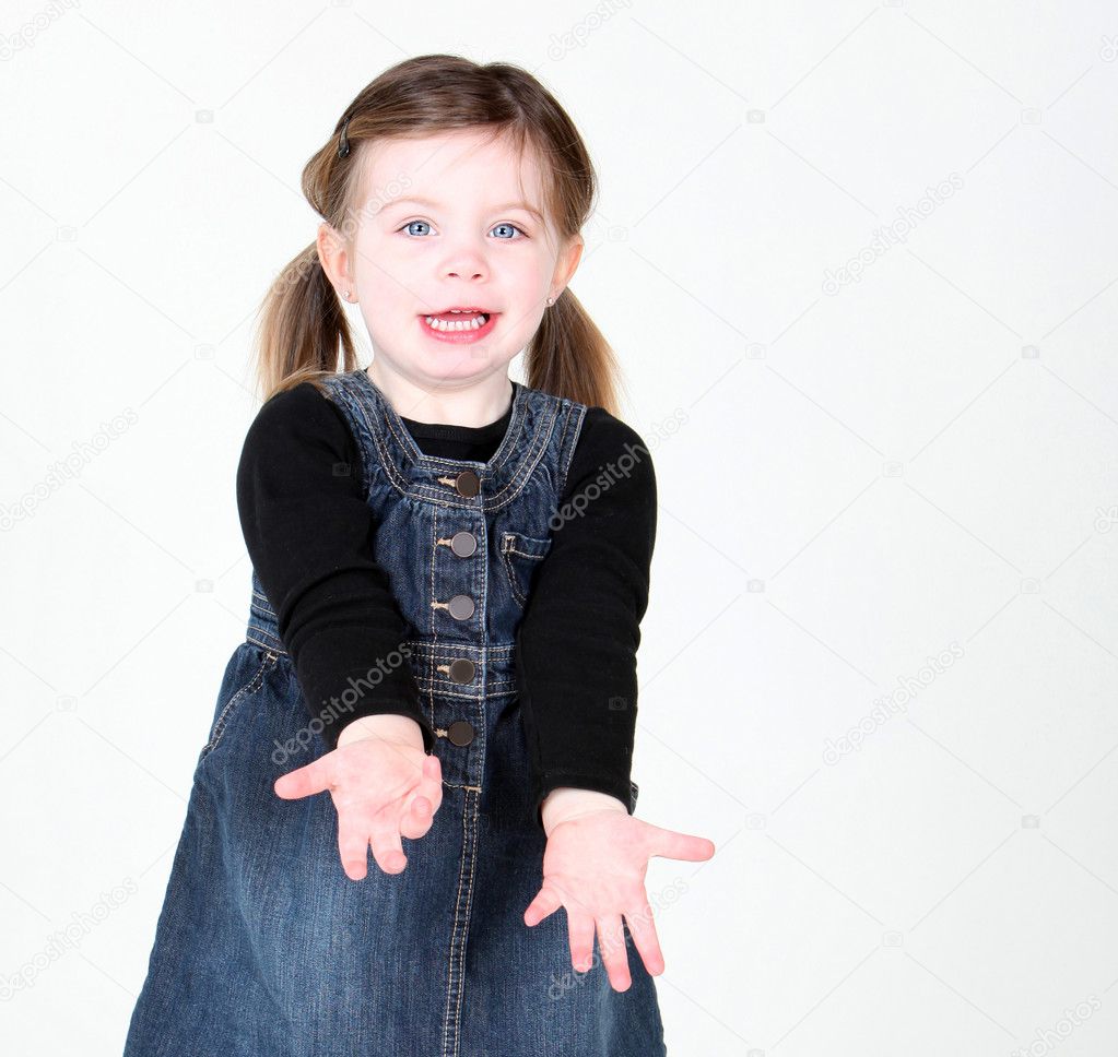 Young girl with arms extended