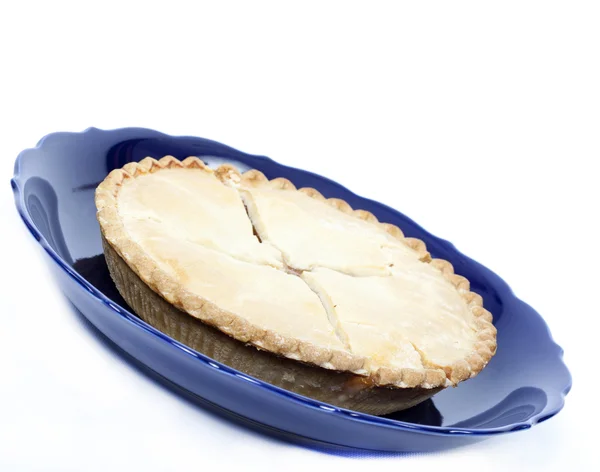 Apple pie in a dish isolated on white — Stock Photo, Image
