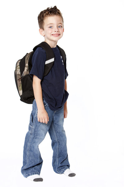 Young schoolboy with backpack