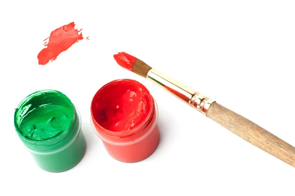Paints with a brush Stock Photo