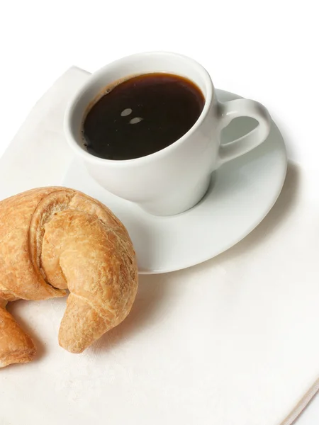 Cup of coffee and croissant — Stock Photo, Image