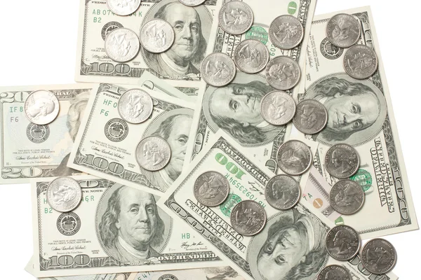 Доллары и монеты — стоковое фото