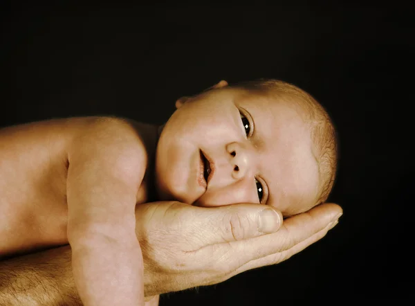 Baby in sepai — Stockfoto