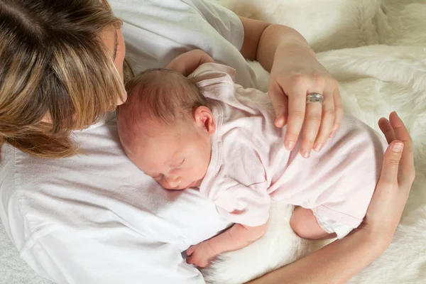 Baby on her belly — Stock Photo, Image