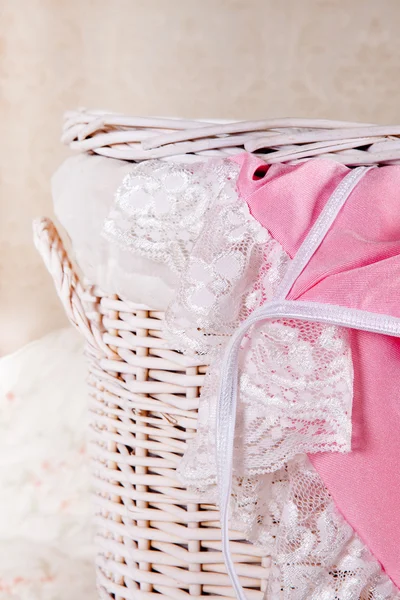 Lace nighties in laundry basket — Stock Photo, Image