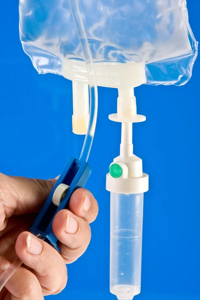 Regulating an IV drip — Stock Photo, Image