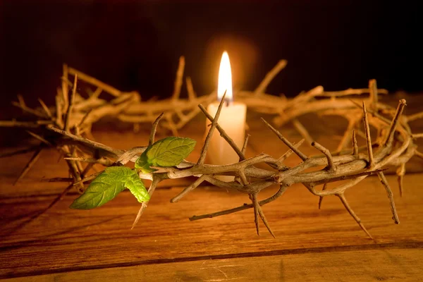 Crown of thorns and candle — Stock Photo, Image