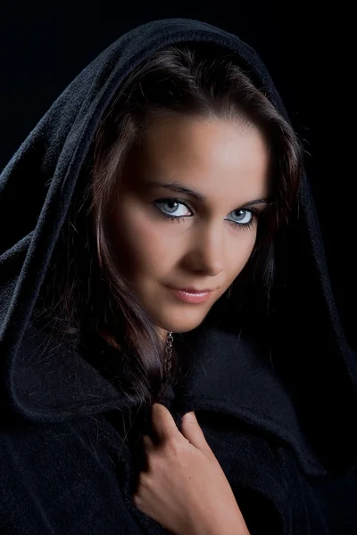 Lady in a black cape — Stock Photo, Image