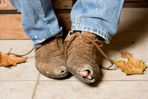 Misshandlade skor — Stockfoto