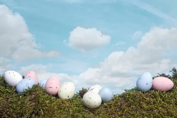 Easter eggs under blue sky — Stock Photo, Image