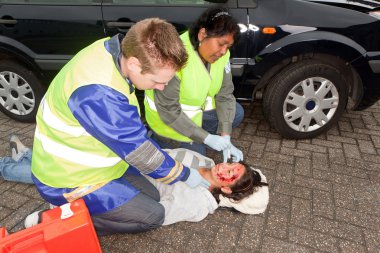 Paramedics in action clipart