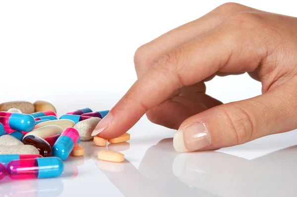 Selecting pills — Stock Photo, Image