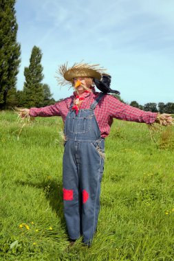 Farmer acting as scarecrow clipart