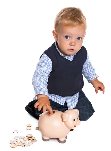 Criança com banco porquinho — Fotografia de Stock