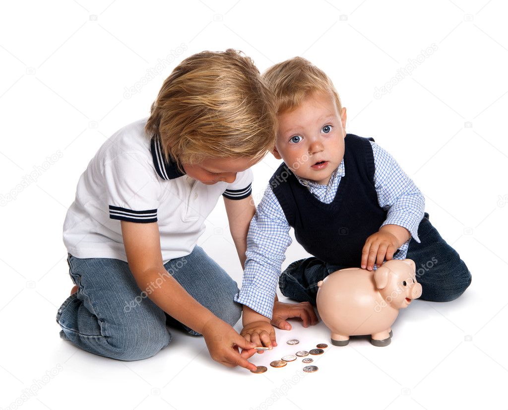 Brothers filling their piggy bank