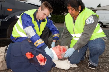 Wounded man in car crash clipart