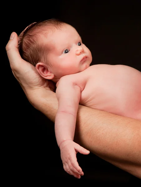 Baby on daddy's arm — Stock Photo, Image