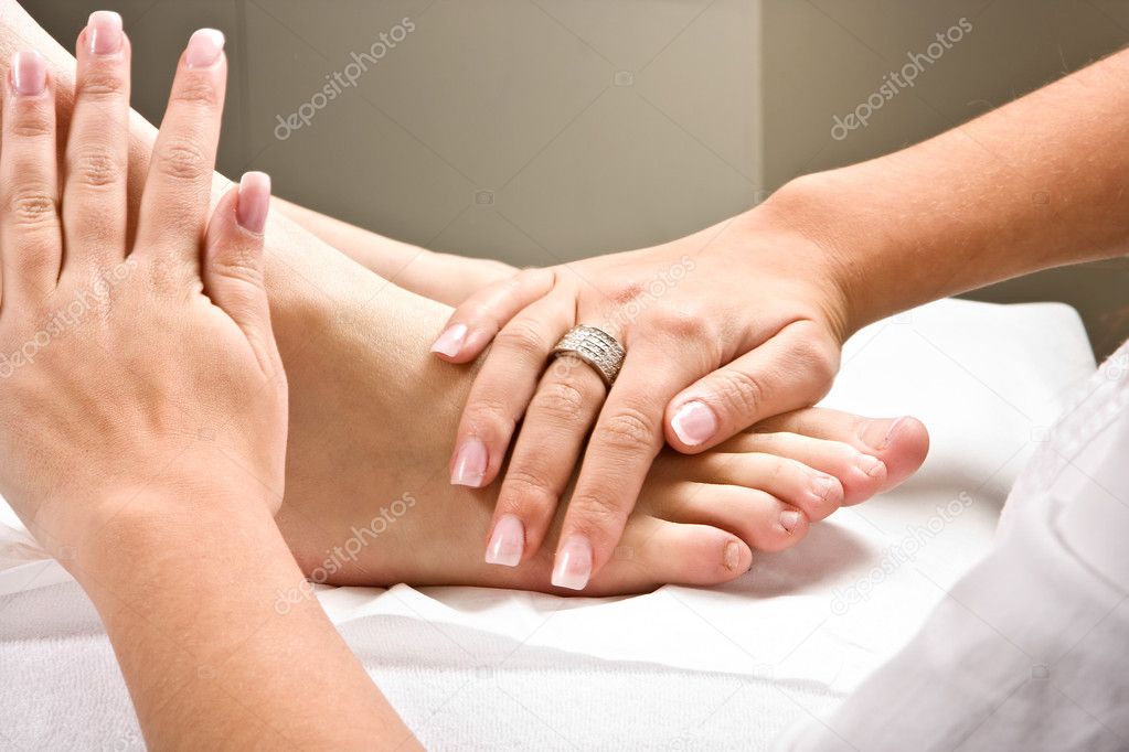 Massaging feet