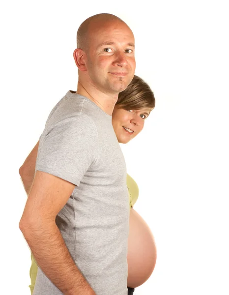 Barriga lisa e barriga grávida — Fotografia de Stock