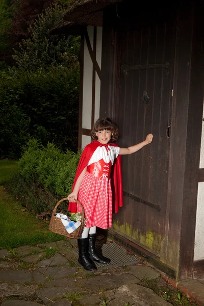 stock image Little red riding hood arriving