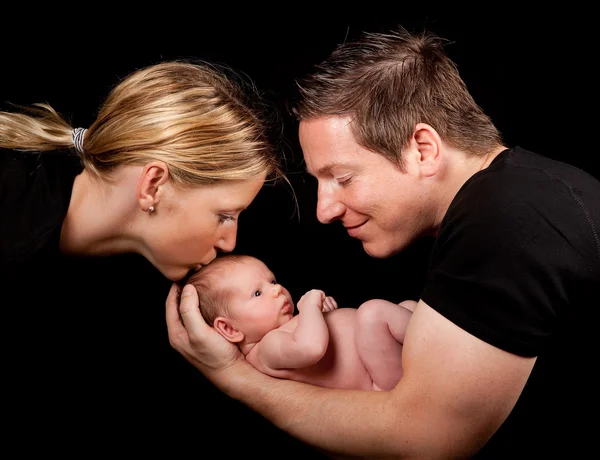 Baby en ouders — Stockfoto