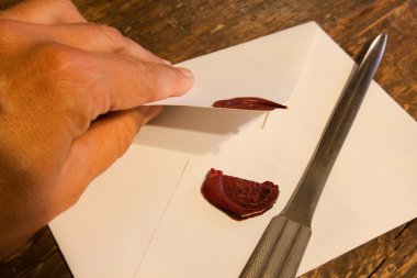 Breaking a wax seal clipart