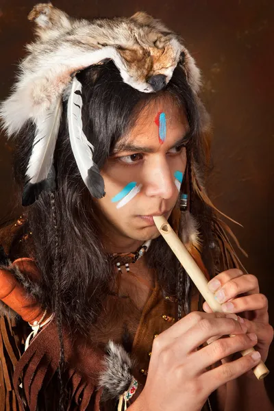 Indian with flute — Stock Photo, Image