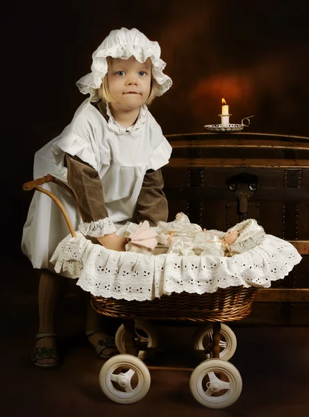 Antique girl and doll — Stock Photo, Image