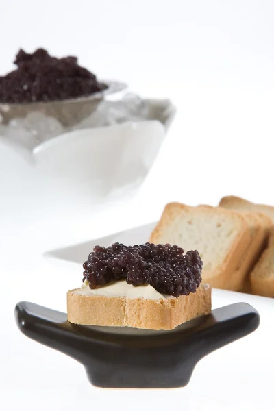 Caviar sobre pan tostado — Foto de Stock
