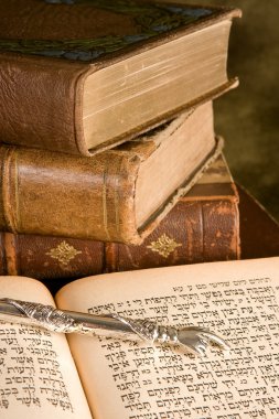 Torah pointer on books clipart