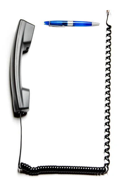 Caneta e cabo de telefone — Fotografia de Stock